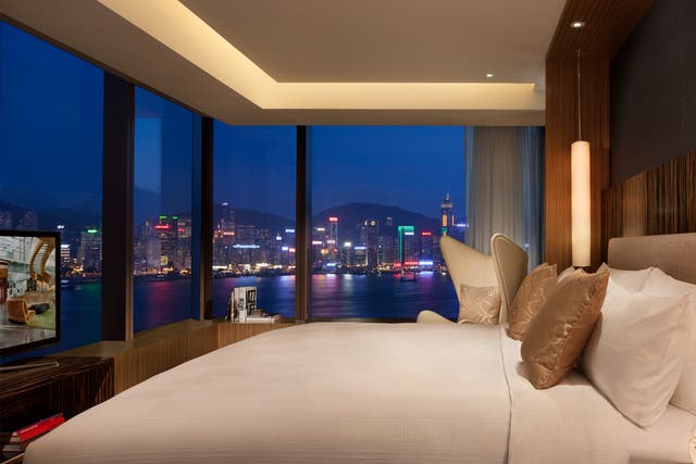 <p>Sleep surrounded by Hong Kong’s twinkling skyline at this Sir Terence Conrad-designed hotel </p>