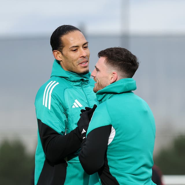 <p>Virgil van Dijk (left) has expressed his desire for Liverpool to keep Andy Robertson</p>