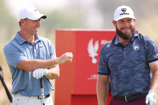 <p>Rory McIlroy and Tyrrell Hatton at the Abu Dhabi HSBC Championship </p>