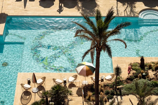 <p>The spacious pool sits in the middle of Bikini Hotel’s gardens, just a stone’s throw from the Mediterranean Sea</p>